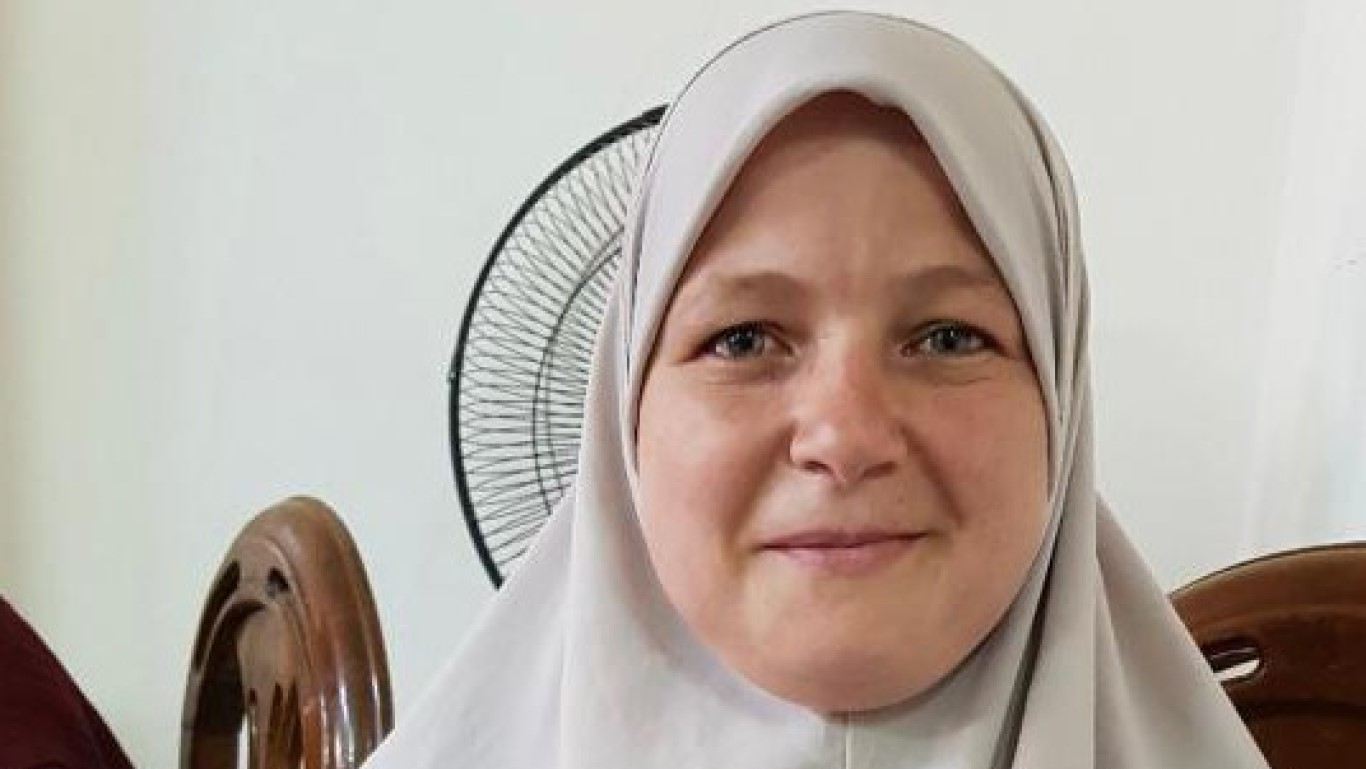our story In the words of Asmaa Emam: "After receiving my national ID card, now I am able to take effective steps in my life and the lives of my children" image